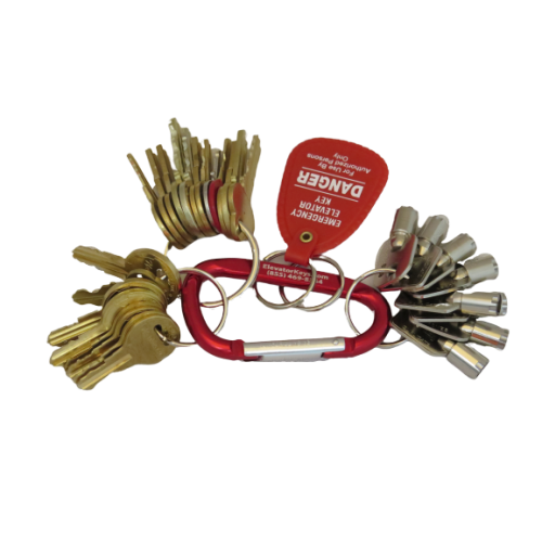 A universal fire-service elevator key set on a carabiner